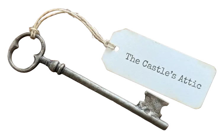 A paper note labeled "The Castle's Attic" attached to a key